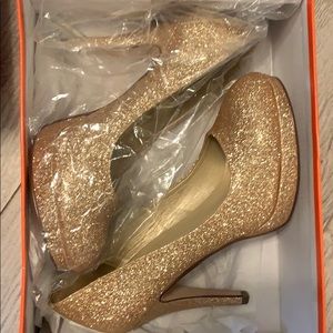 Gold heels- worn once. Still in original packaging